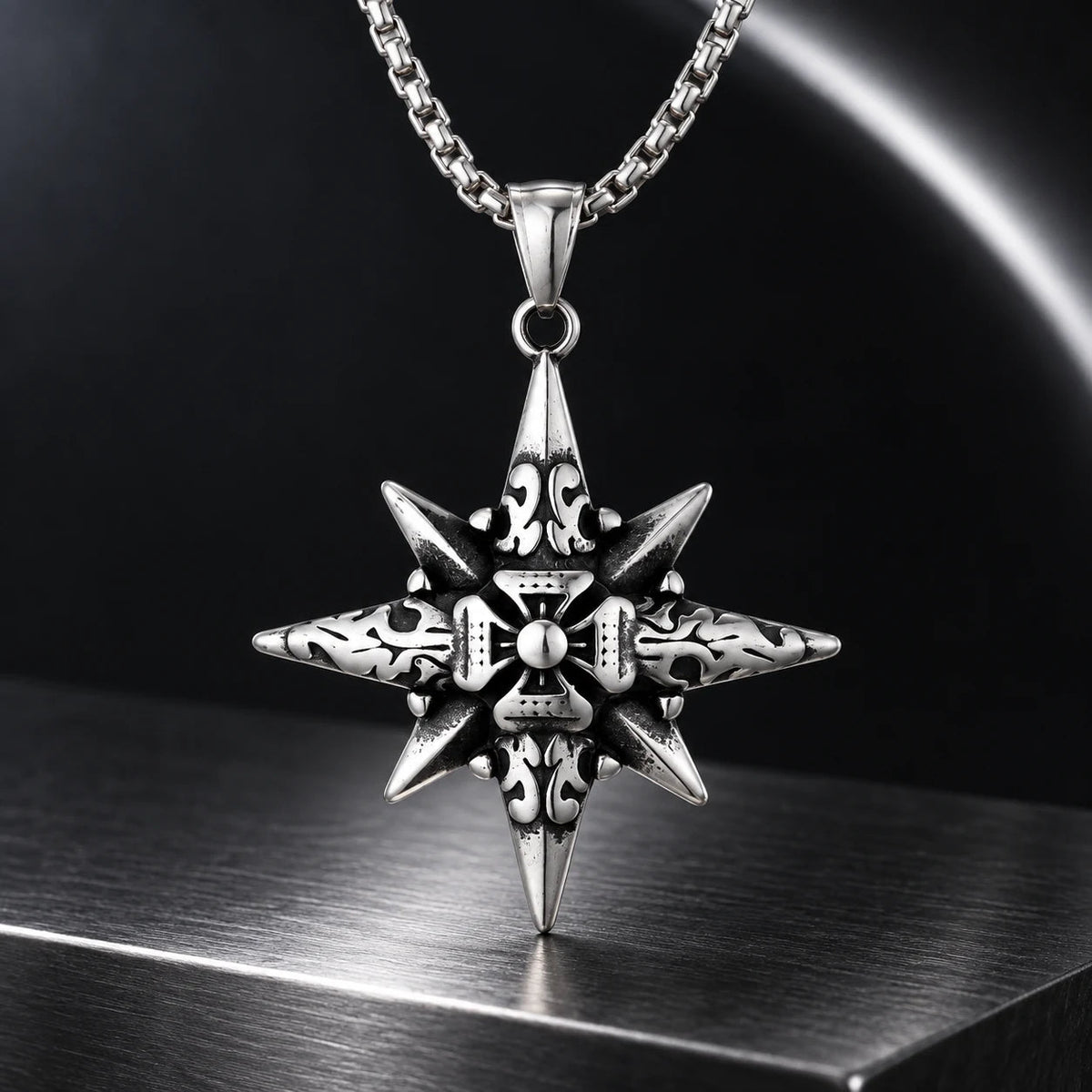 Vesper Cross Necklace — silver-tone product in a dark chrome studio setting