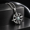 Wayfinder Compass Necklace — silver-tone product in a dark chrome studio setting