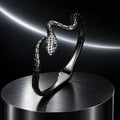 Serpent Cuff — product in a dark chrome studio setting
