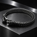 Twin Serpent Bracelet — Dark silver tone in a dark chrome studio setting