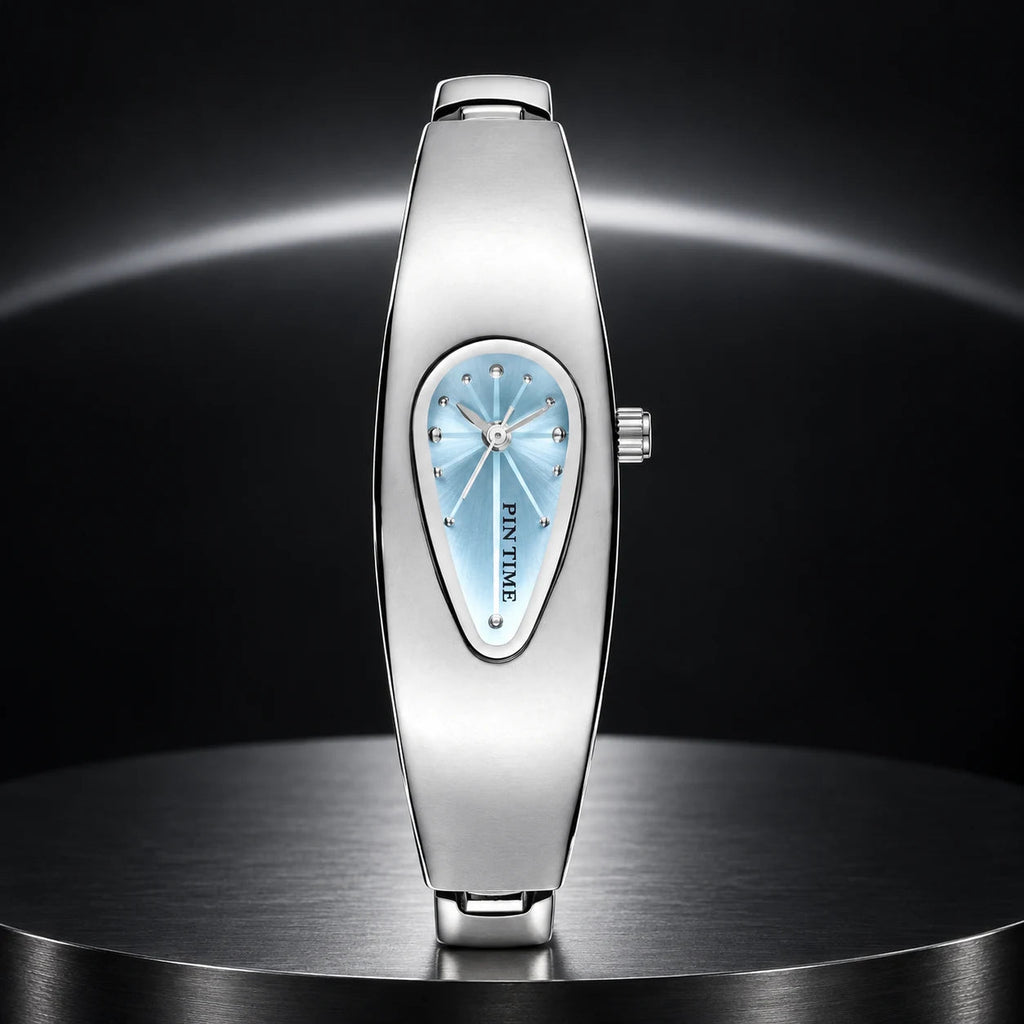 Liquid Drop Watch — Blue in a dark chrome studio setting