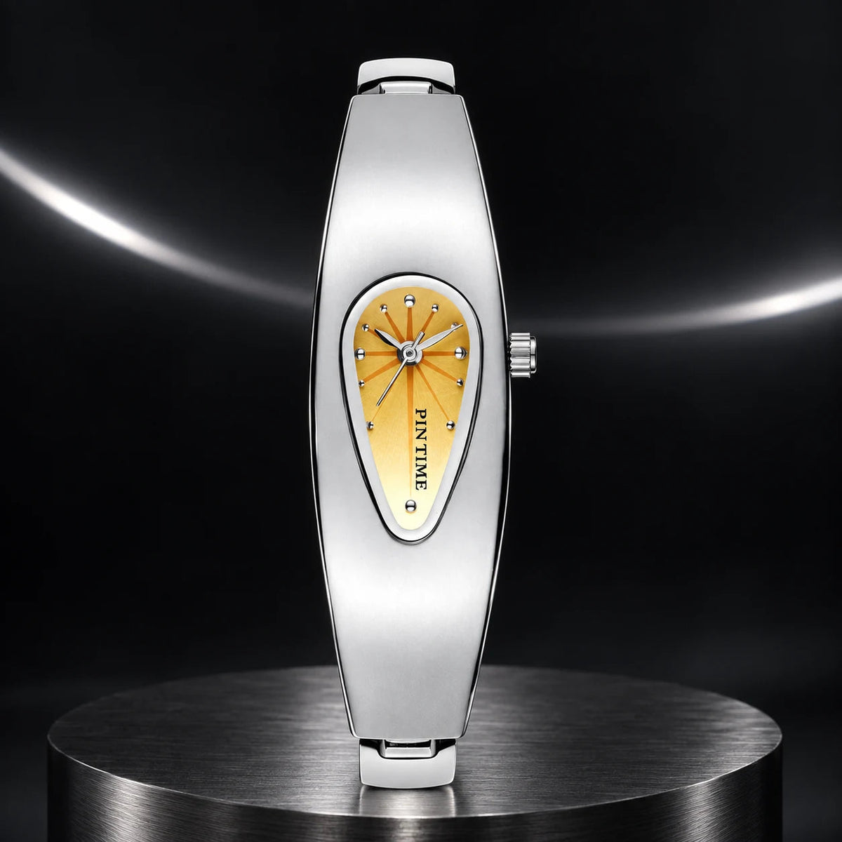 Liquid Drop Watch — Yellow in a dark chrome studio setting