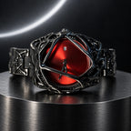 Spiderweb Watch — Black and Red in a dark chrome studio setting