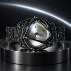 Spiderweb Watch — Black and White in a dark chrome studio setting
