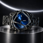 Spiderweb Watch — Dark Blue in a dark chrome studio setting