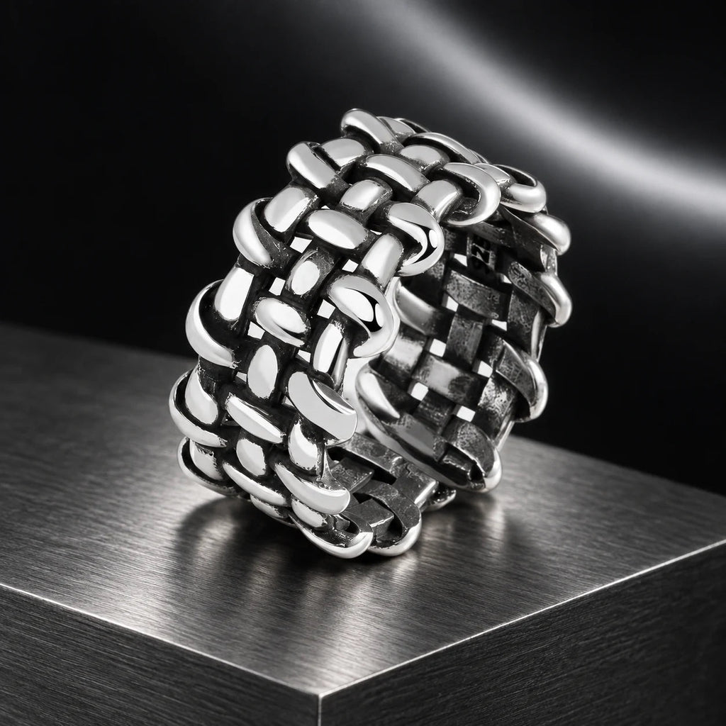 Archive Weave Ring — product in a dark chrome studio setting