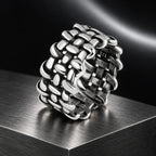 Archive Weave Ring — product in a dark chrome studio setting