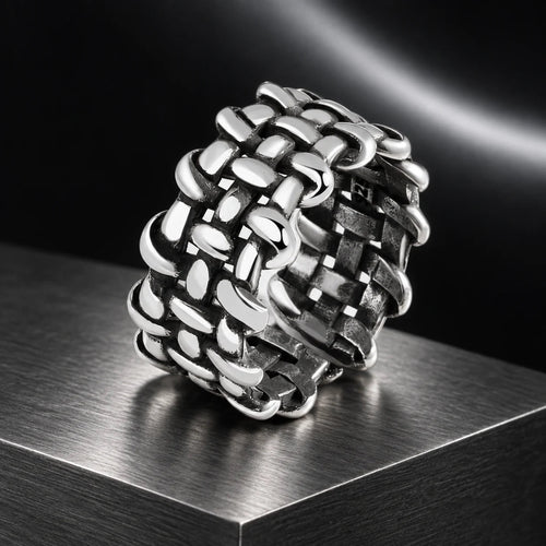 Archive Weave Ring — product in a dark chrome studio setting