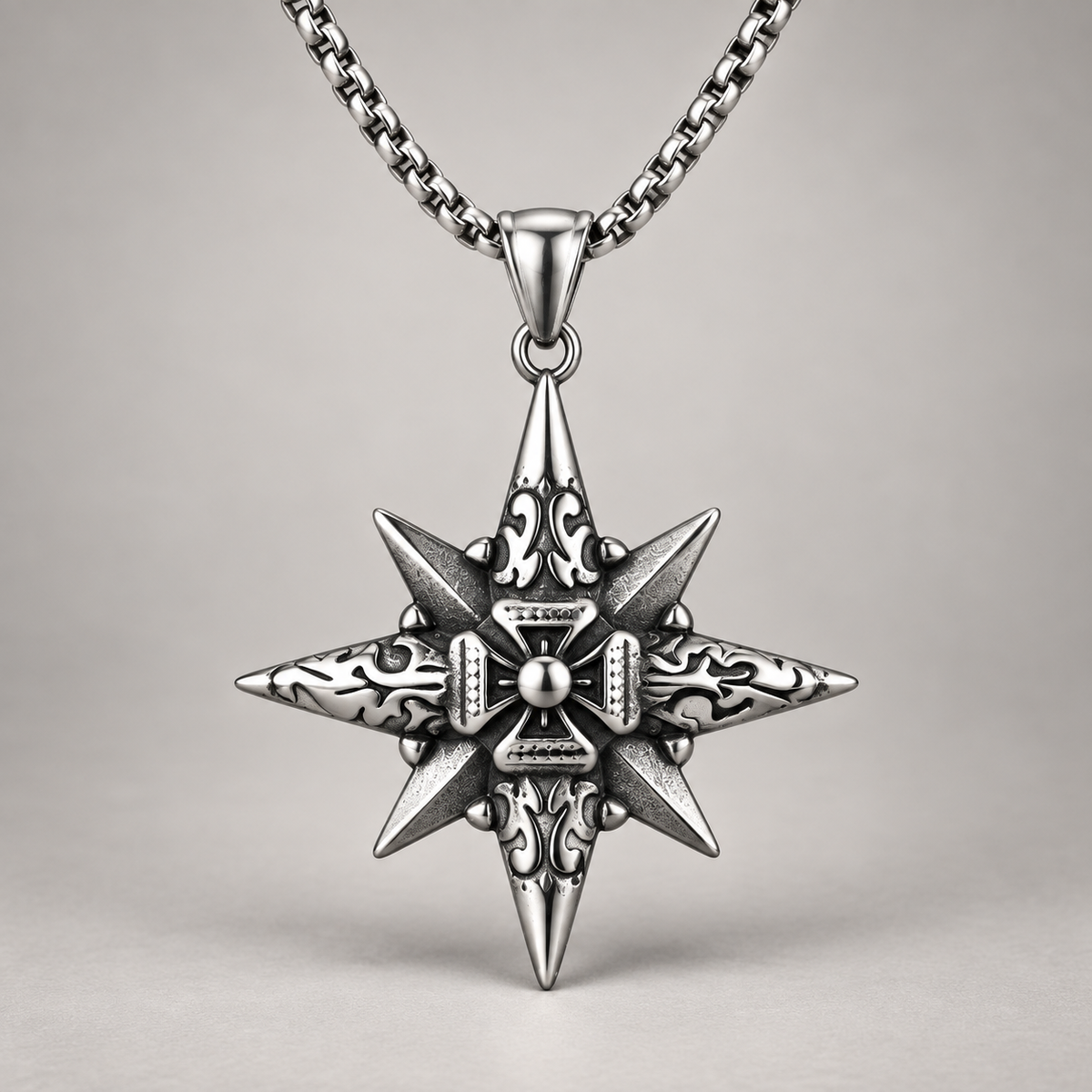 Vesper Cross Necklace in silver tone, front view of the eight point pendant and rounded box chain